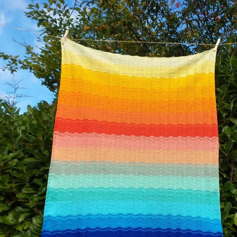 sunset blanket pattern by amy in catona yarn